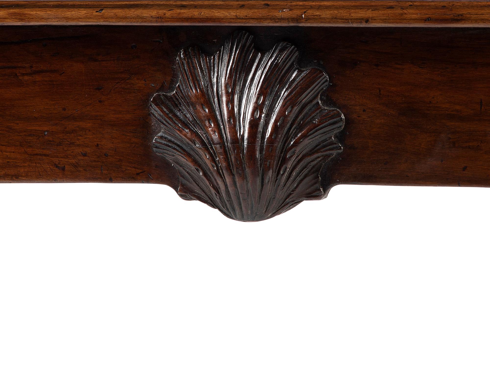 An Irish George III Shell, Acanthus and Bell-Flower Carved and Figured Mahogany Hairy Paw Foot Side Table