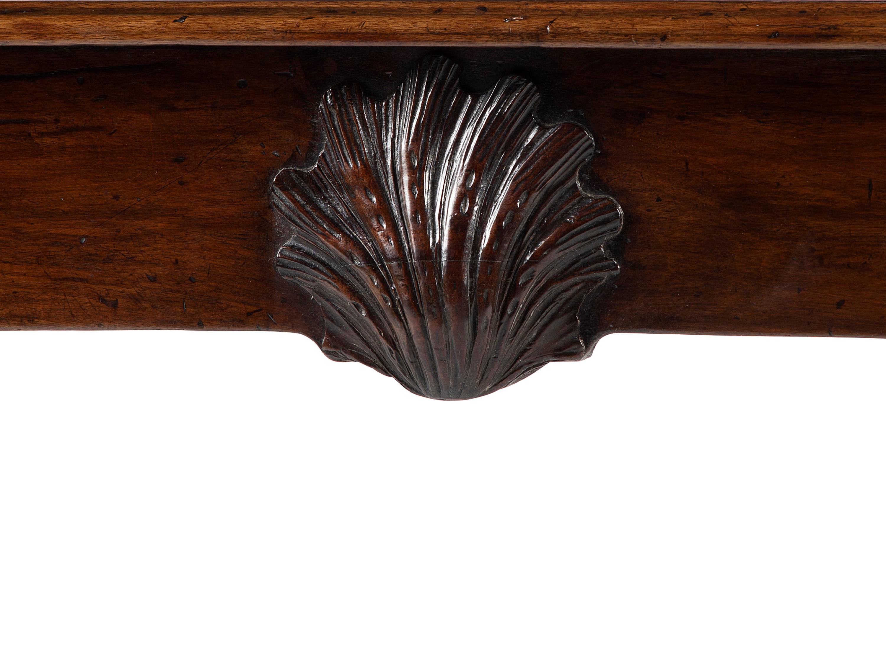 An Irish George III Shell, Acanthus and Bell-Flower Carved and Figured Mahogany Hairy Paw Foot Side Table