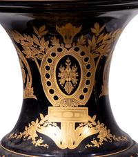 A Pair of Monumental Sèvres Style Gilt Metal Mounted Porcelain Covered Urns on Pedestals