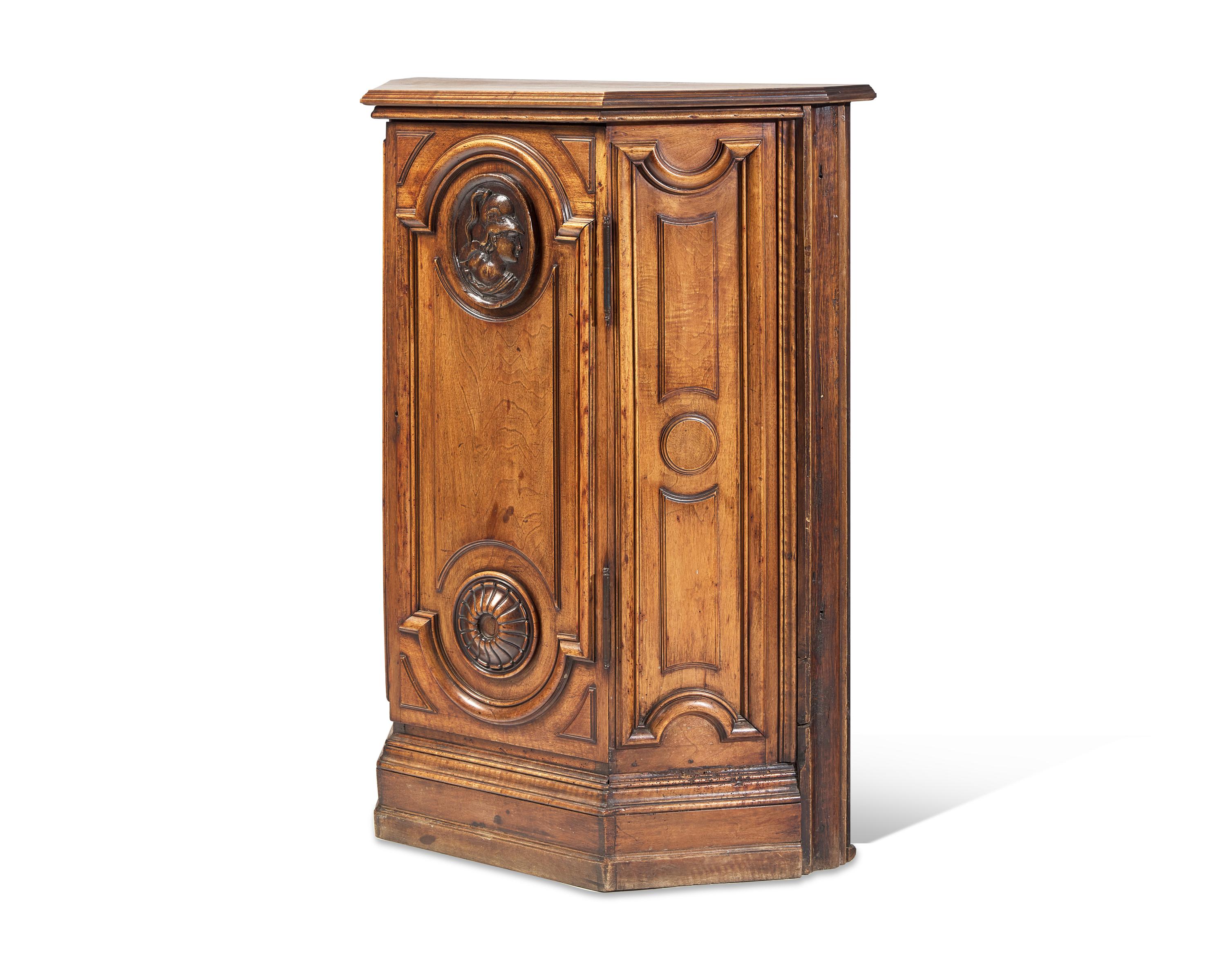 A Small Italian Carved Walnut Cabinet