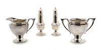 A Group of Two American Sterling Silver Casters, Empire, Height of pair 5 1/8 inches.