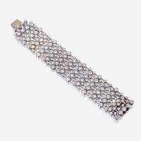 An eighteen karat white gold and diamond bracelet