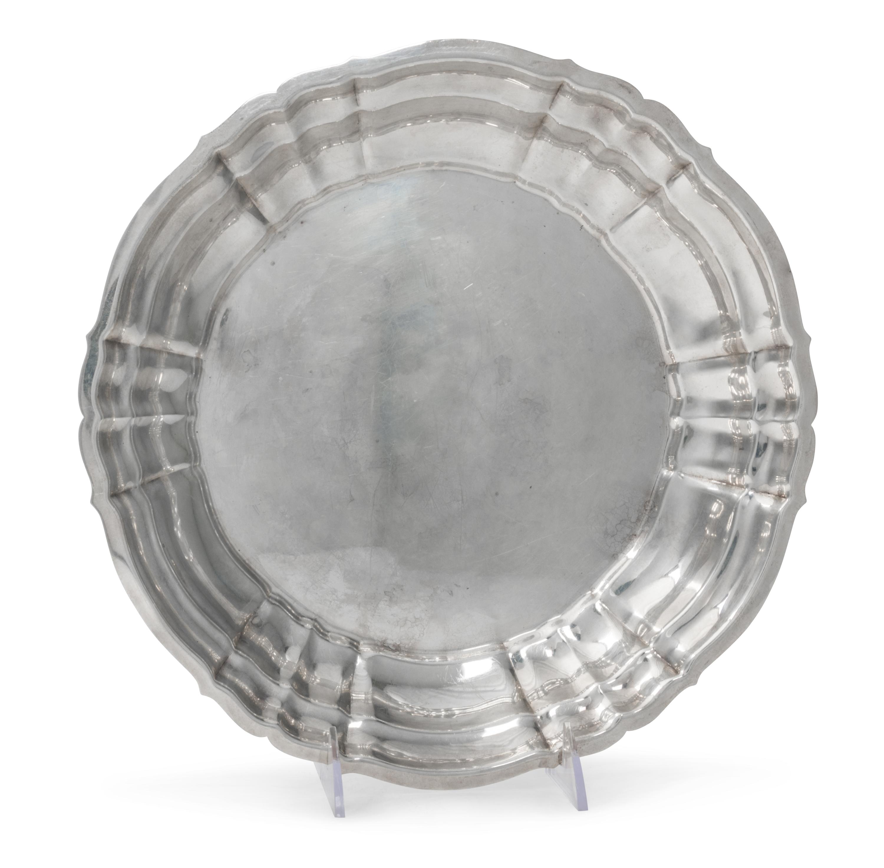 An American Silver Bowl, Gorham Mfg. Co., Providence, RI, Chippendale pattern, with a shaped circular border.