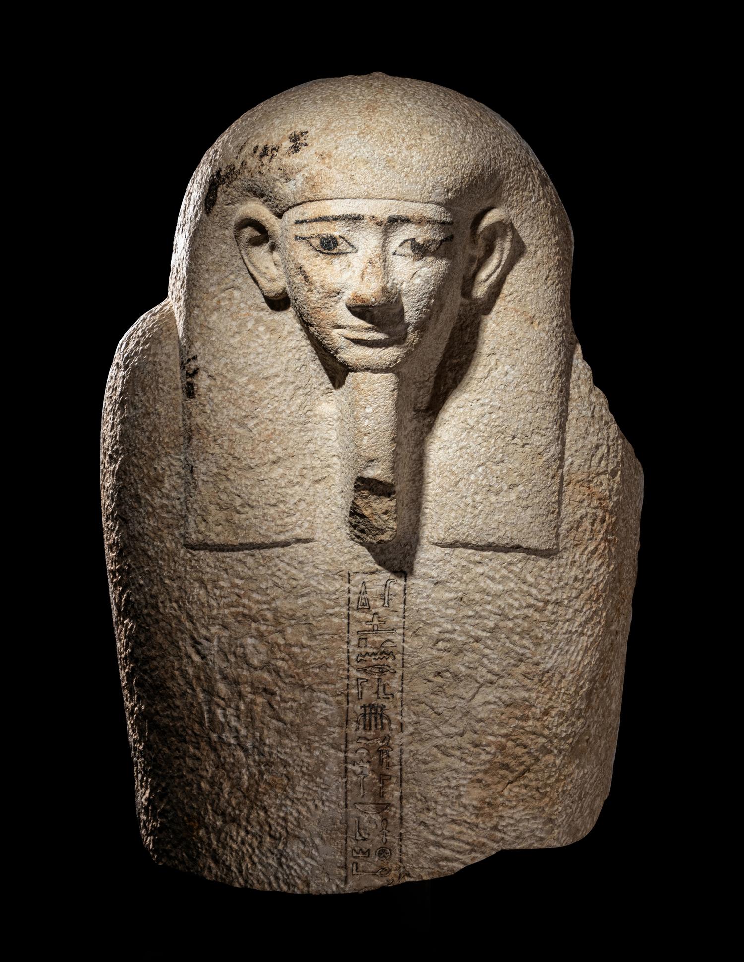 An Egyptian Limestone Sarcophagus Lid