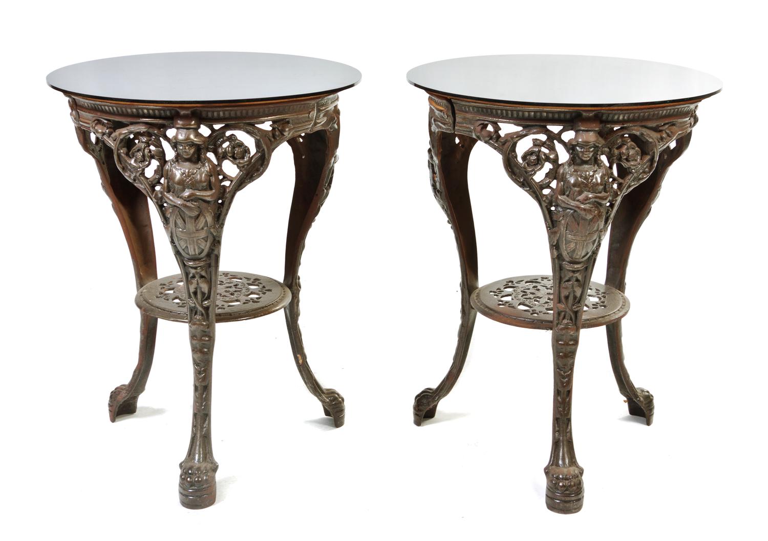 A Pair of Victorian Style Cast Iron Cafe Tables, Height 27 1/4 x diameter 21 inches.