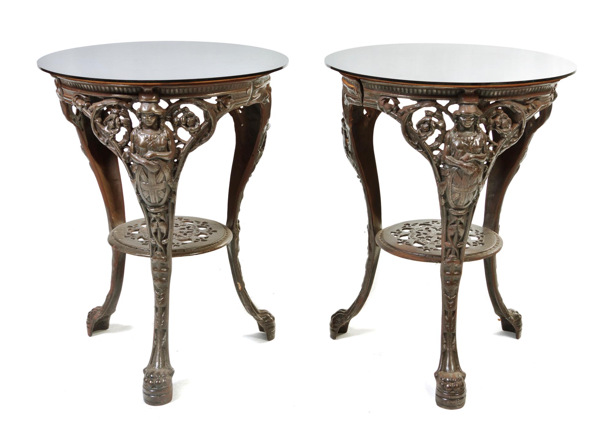 A Pair of Victorian Style Cast Iron Cafe Tables, Height 27 1/4 x diameter 21 inches.