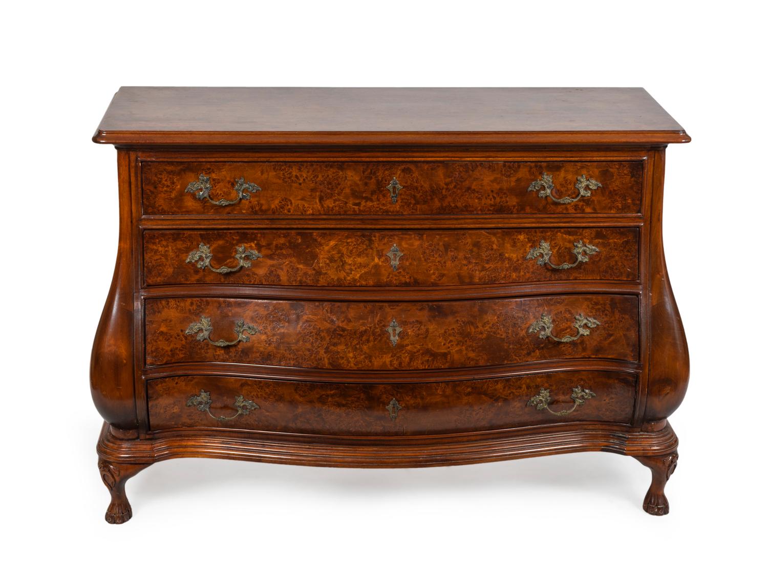 A Continental Burled Walnut Bombe Chest of Drawers — 20TH CENTURY