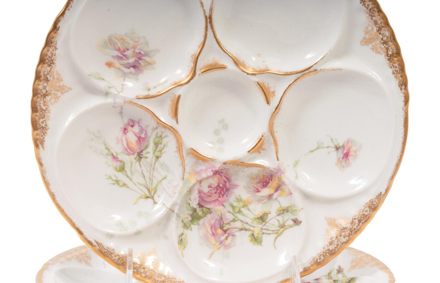 A Set of Six Theodore Haviland Limoges Porcelain Oyster Plates