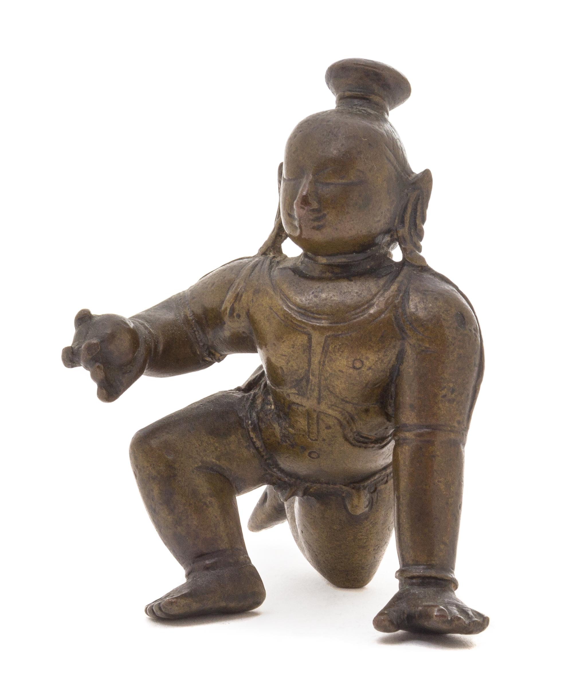 An Indian Bronze Deity Height 3 1/4 inches.