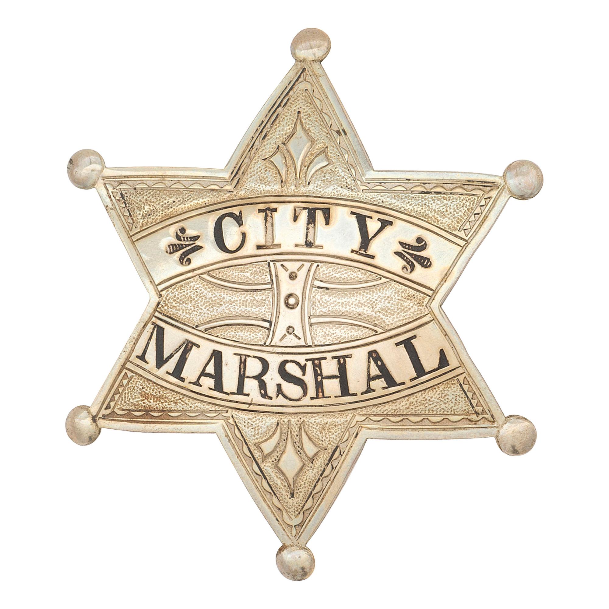 [WESTERN AMERICANA] -- [LAW ENFORCEMENT]. A group of 6 items, incl. buttons promoting sheriffs and "City Marshal" badge. N.p., n.d.