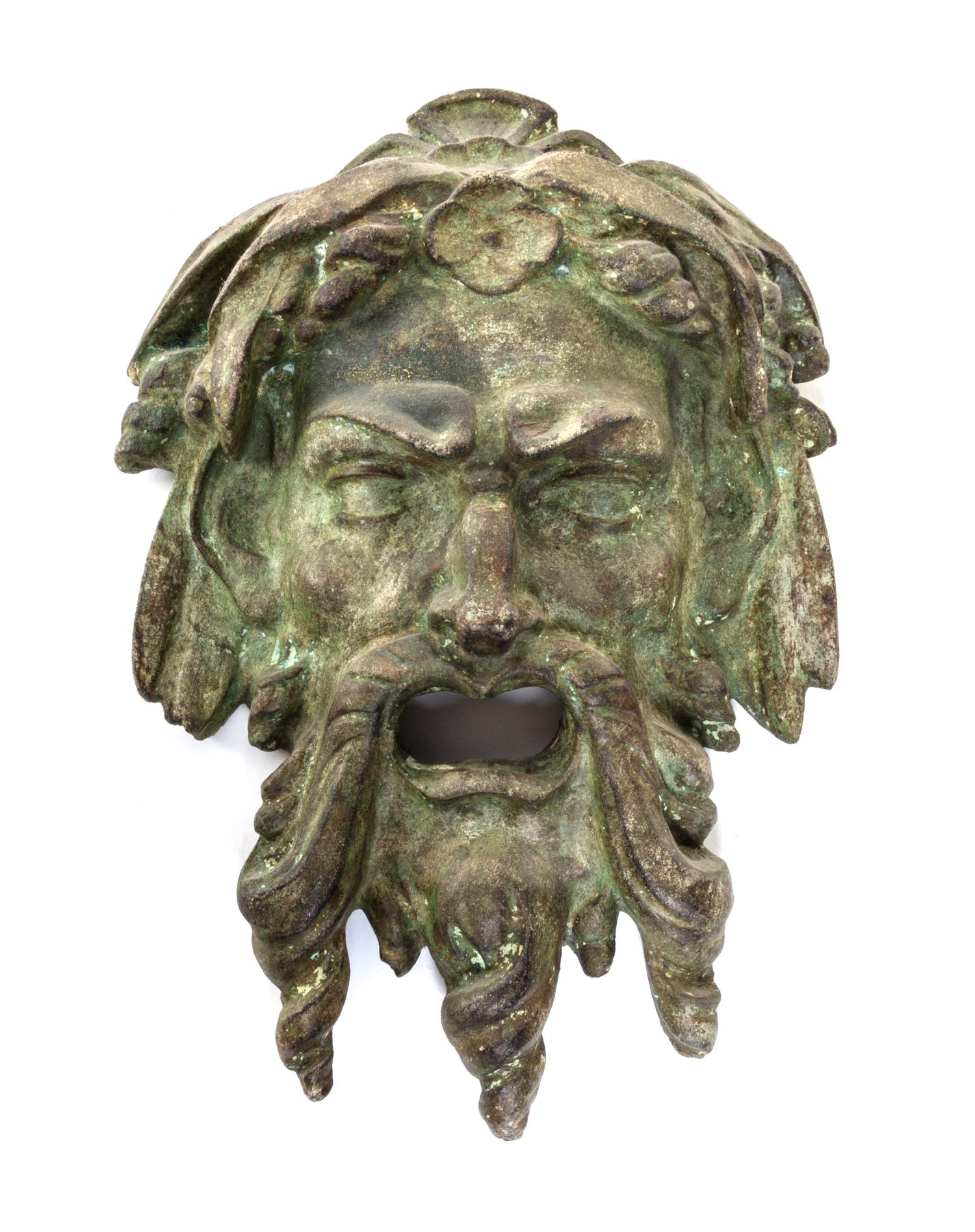 A Neoclassical Patinated Cast Stone Mask Height 16 inches. — 19TH/20TH CENTURY