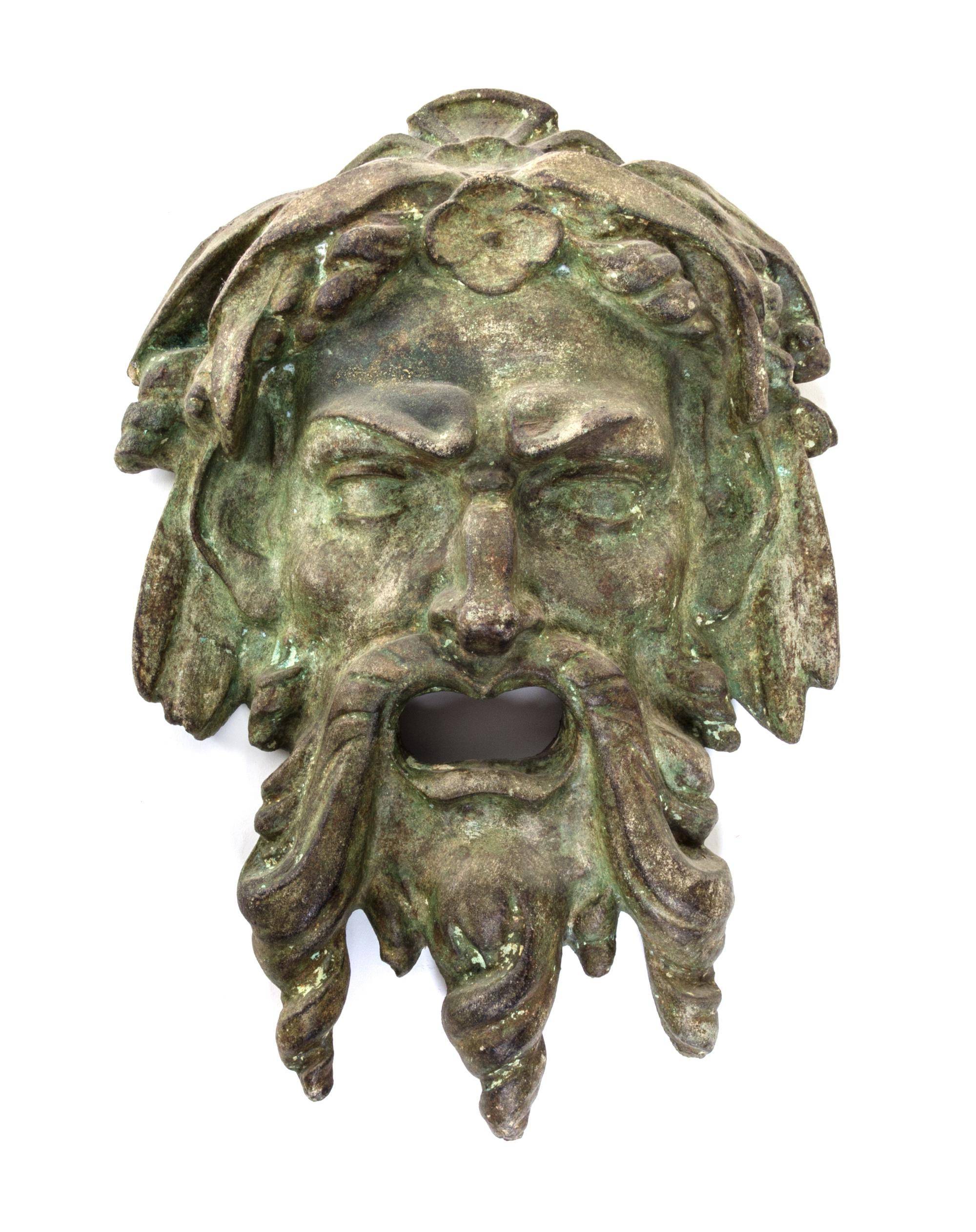 A Neoclassical Patinated Cast Stone Mask Height 16 inches. — 19TH/20TH CENTURY