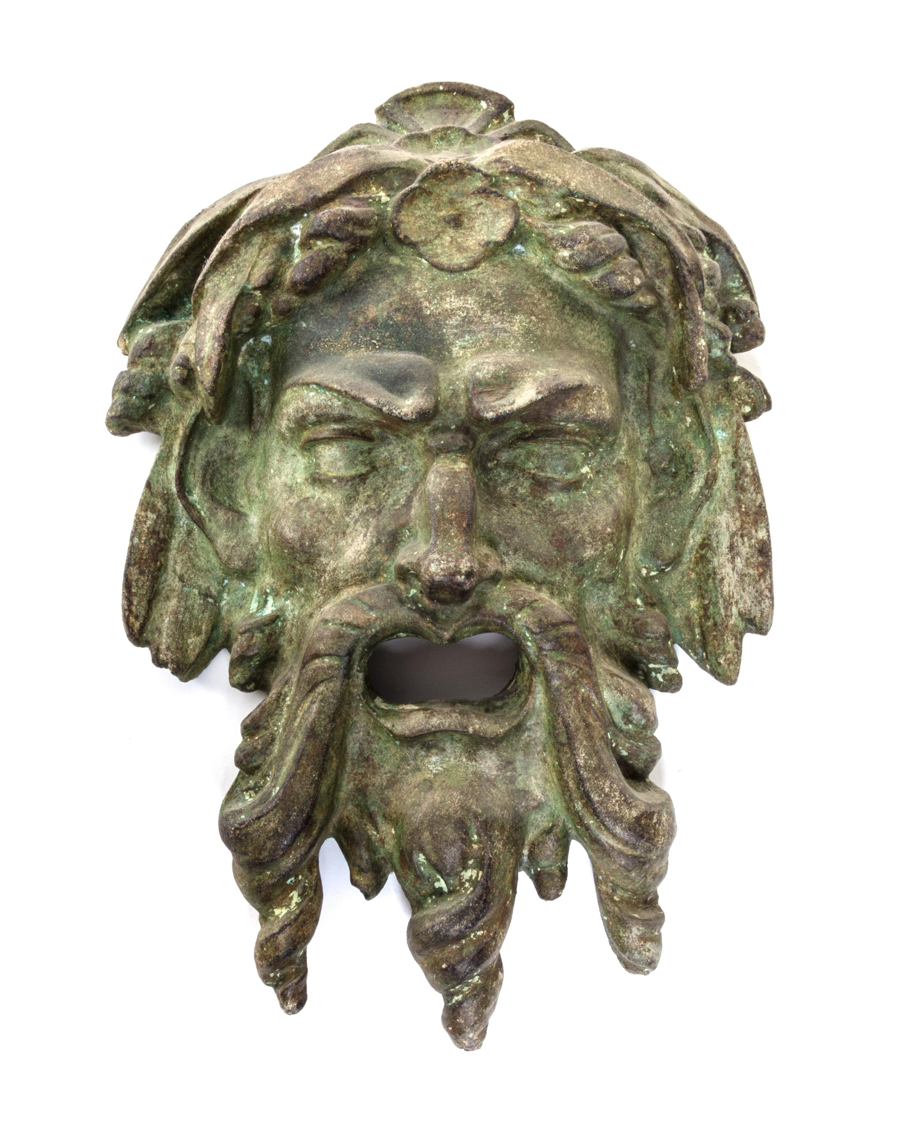A Neoclassical Patinated Cast Stone Mask Height 16 inches. — 19TH/20TH CENTURY