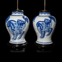 A Pair of Chinese Blue and White 'Buddhist Lion' Porcelain Jars, Kangxi Period or Later 清康熙或更晚 青花佛獅紋罐一對