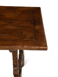 A Spanish Walnut and Wrought Iron Trestle Table