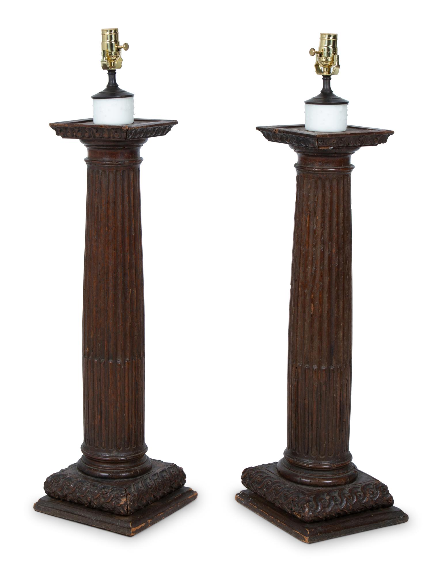 A Pair of Italian Carved Walnut Columns Mounted as Lamps — 18TH CENTURY