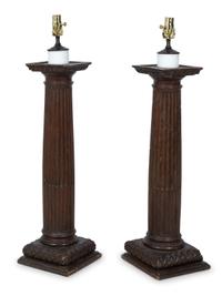 A Pair of Italian Carved Walnut Columns Mounted as Lamps — 18TH CENTURY