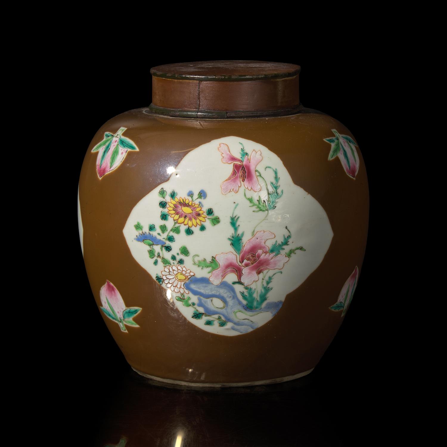 A Chinese Café-au-Lait Ground Famille Rose Jar, 18th Century — 清中期 烏金地開光粉彩花卉罐