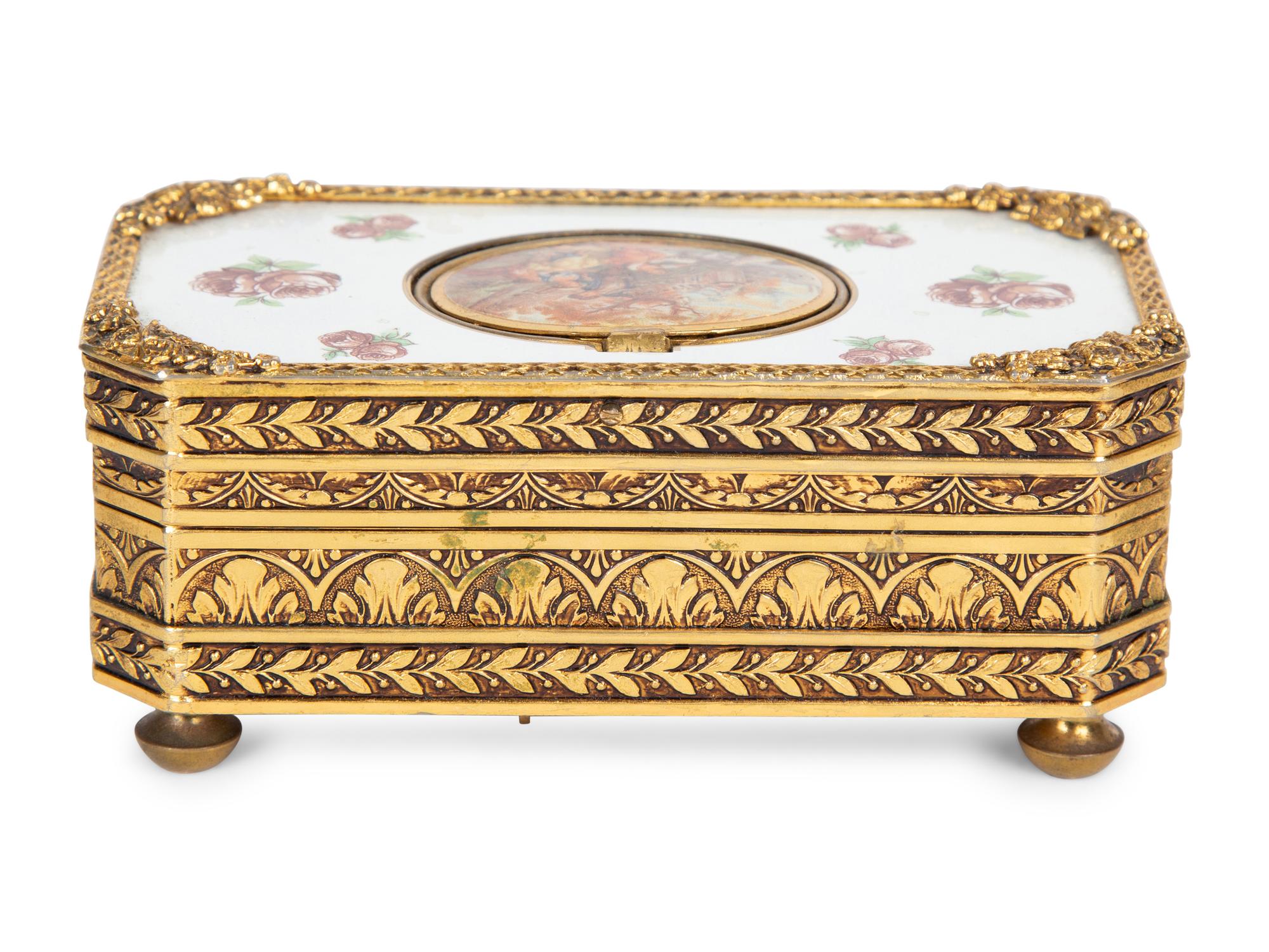 A West German Gilt Metal and Enamel Singing Bird Automaton Box — 20TH CENTURY