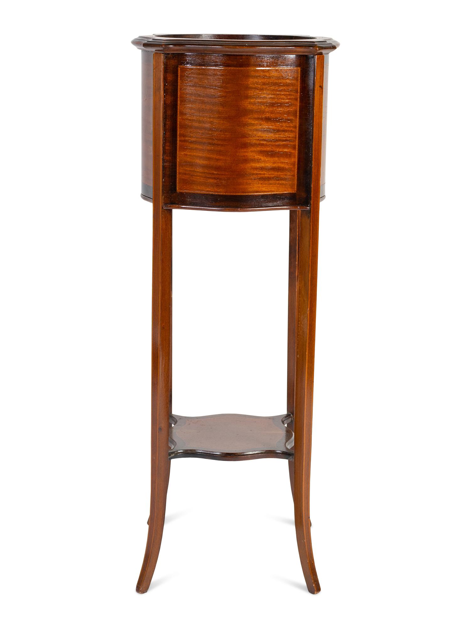 A Federal Style Mahogany Plant Stand Height 38 1/2 x width 13 x depth 13 inches.