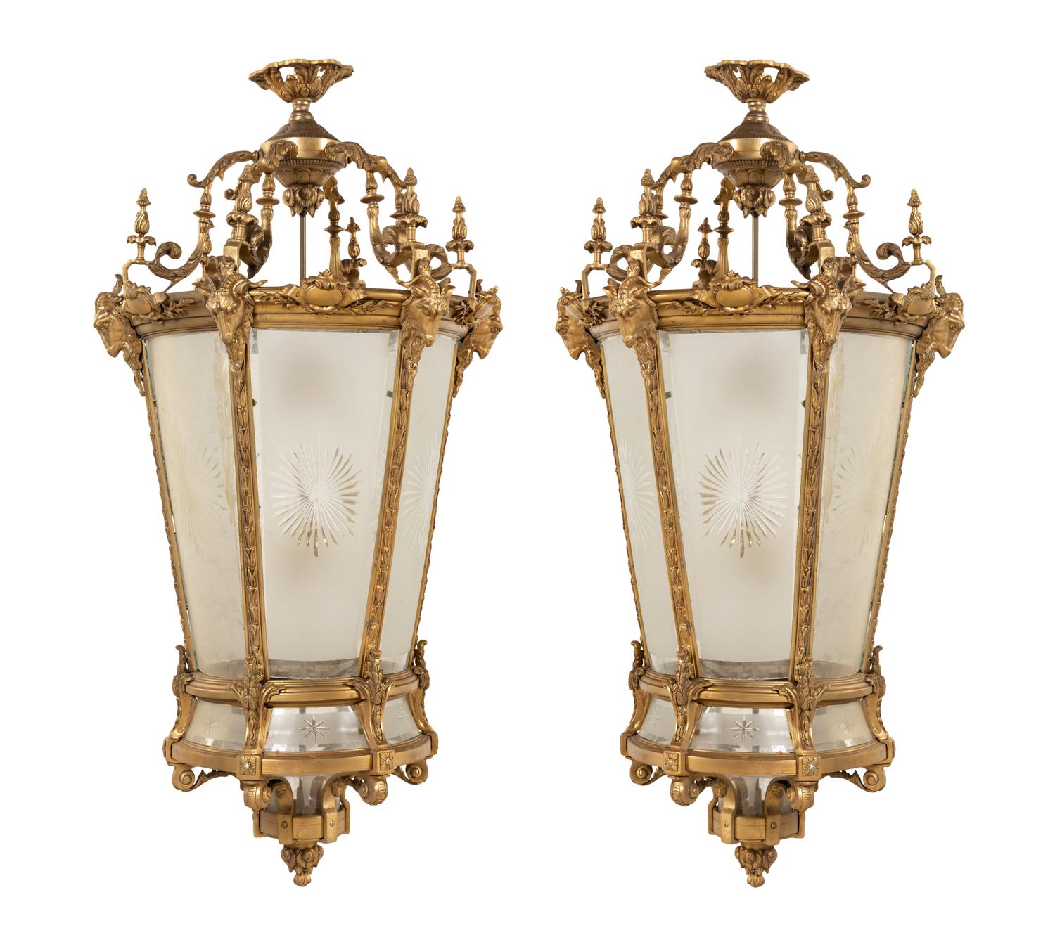 A Pair of Louis XVI Style Gilt Bronze and Frosted Glass Hall Lanterns