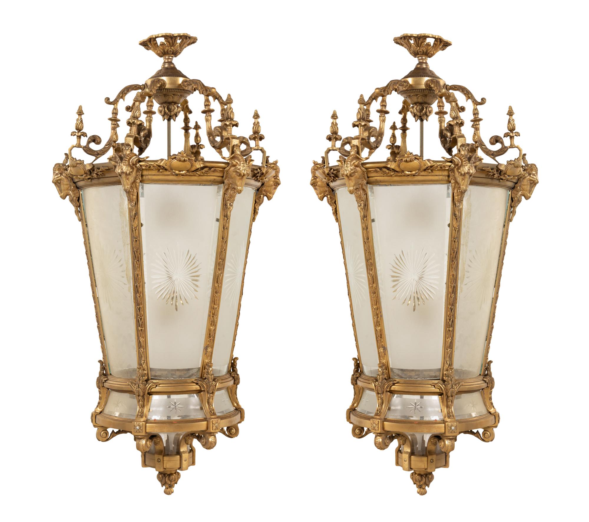A Pair of Louis XVI Style Gilt Bronze and Frosted Glass Hall Lanterns