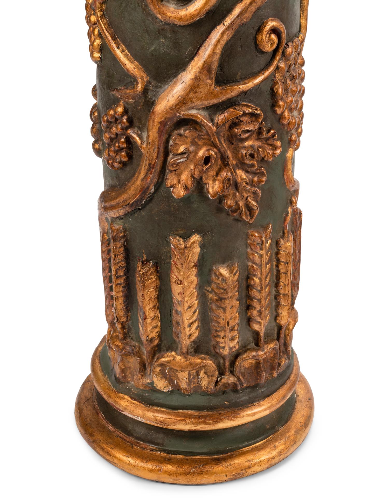 A Pair of Continental Painted and Parcel Gilt Columns