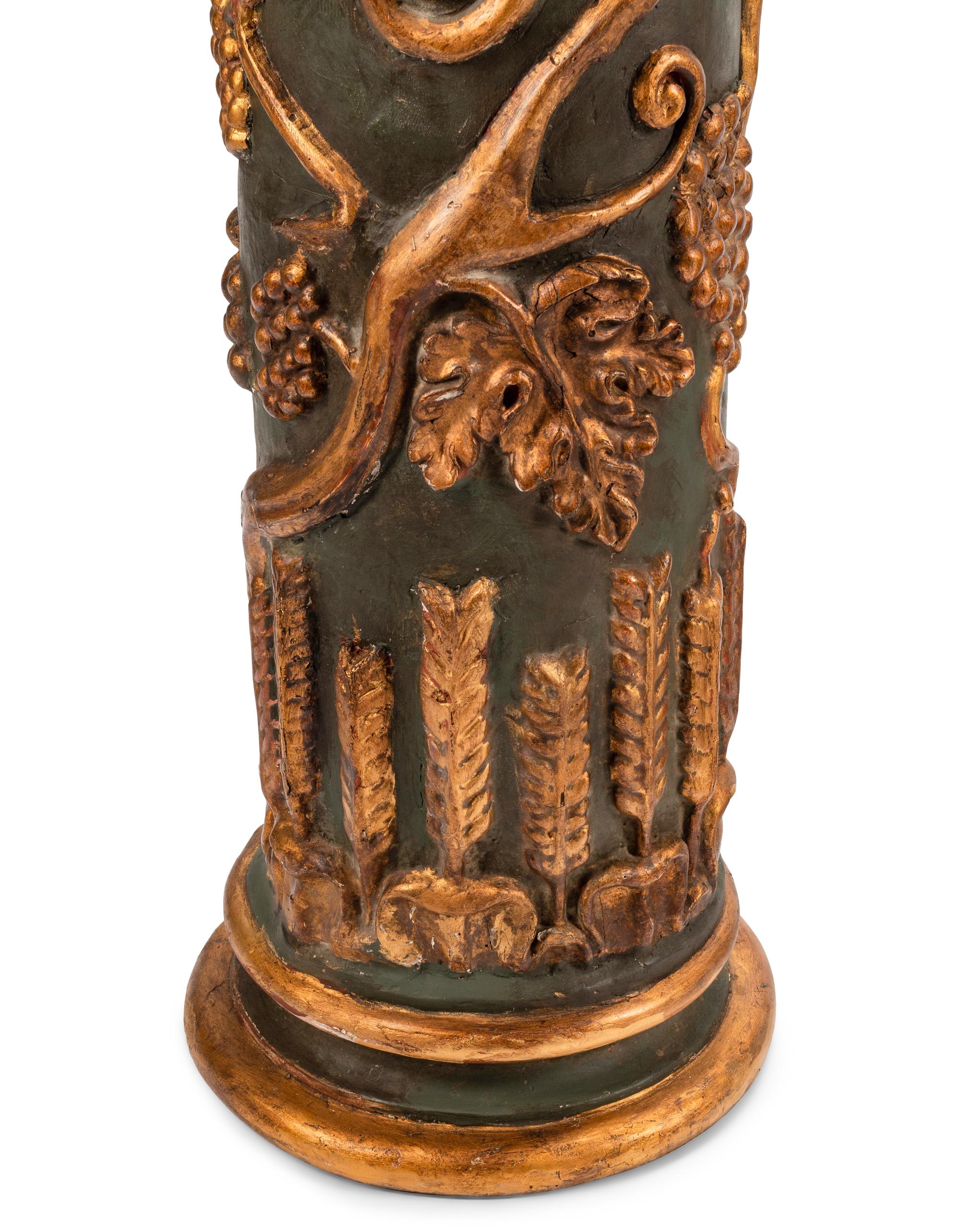 A Pair of Continental Painted and Parcel Gilt Columns