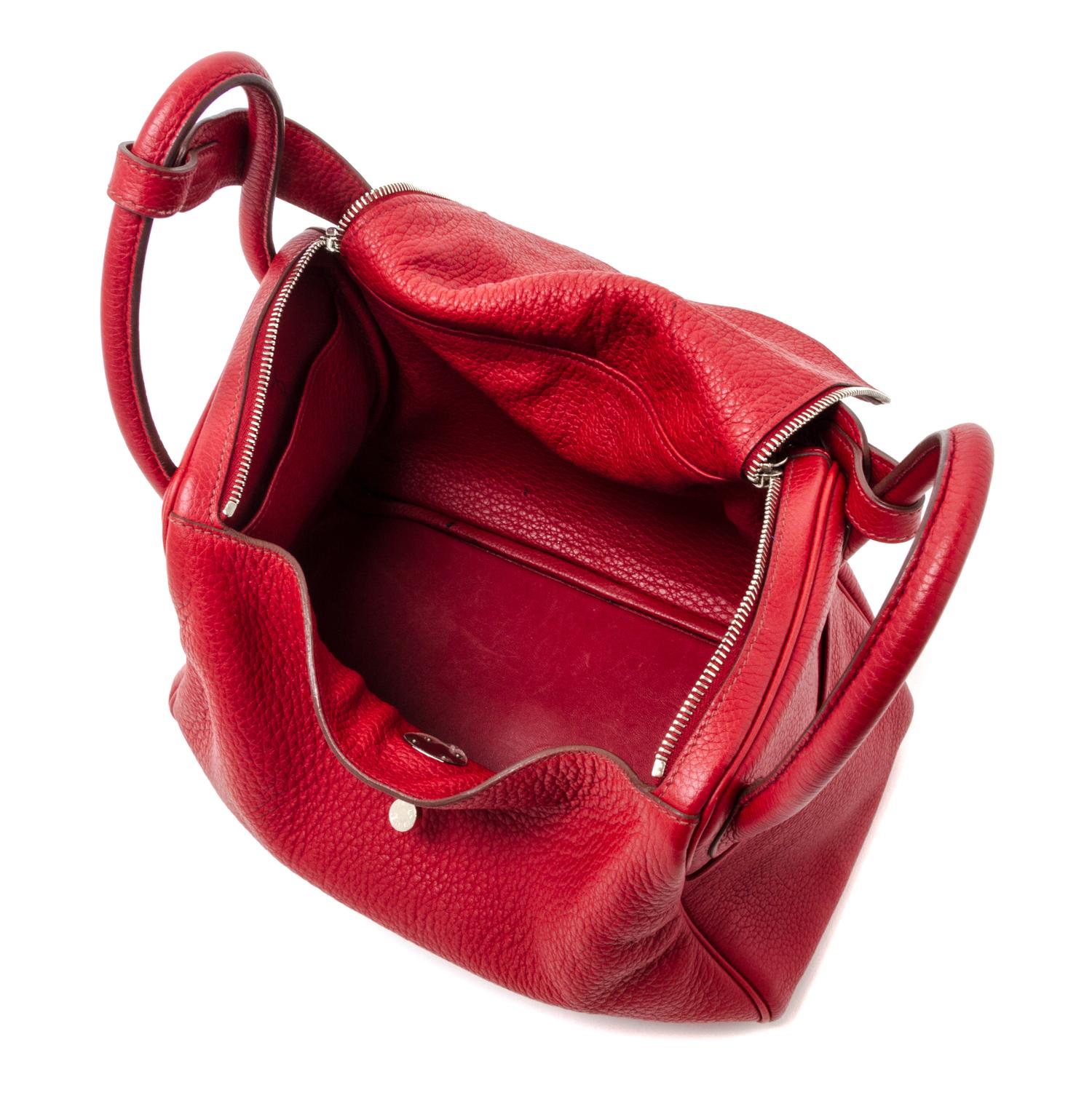 An Hermes Rouge Garance Taurillon Clemence Lindy 30 Handbag, 12" x 7.5" x 6.5".