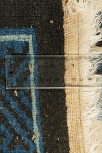 A Chinese Blue and White Wool Runner