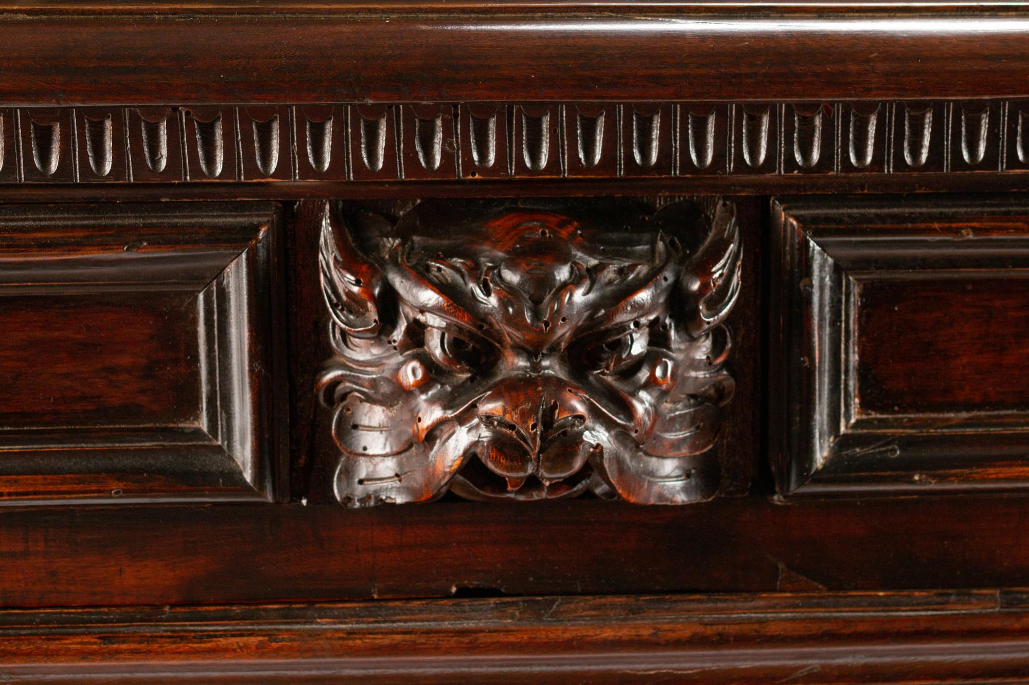 An Italian Baroque Walnut Chest of Drawers