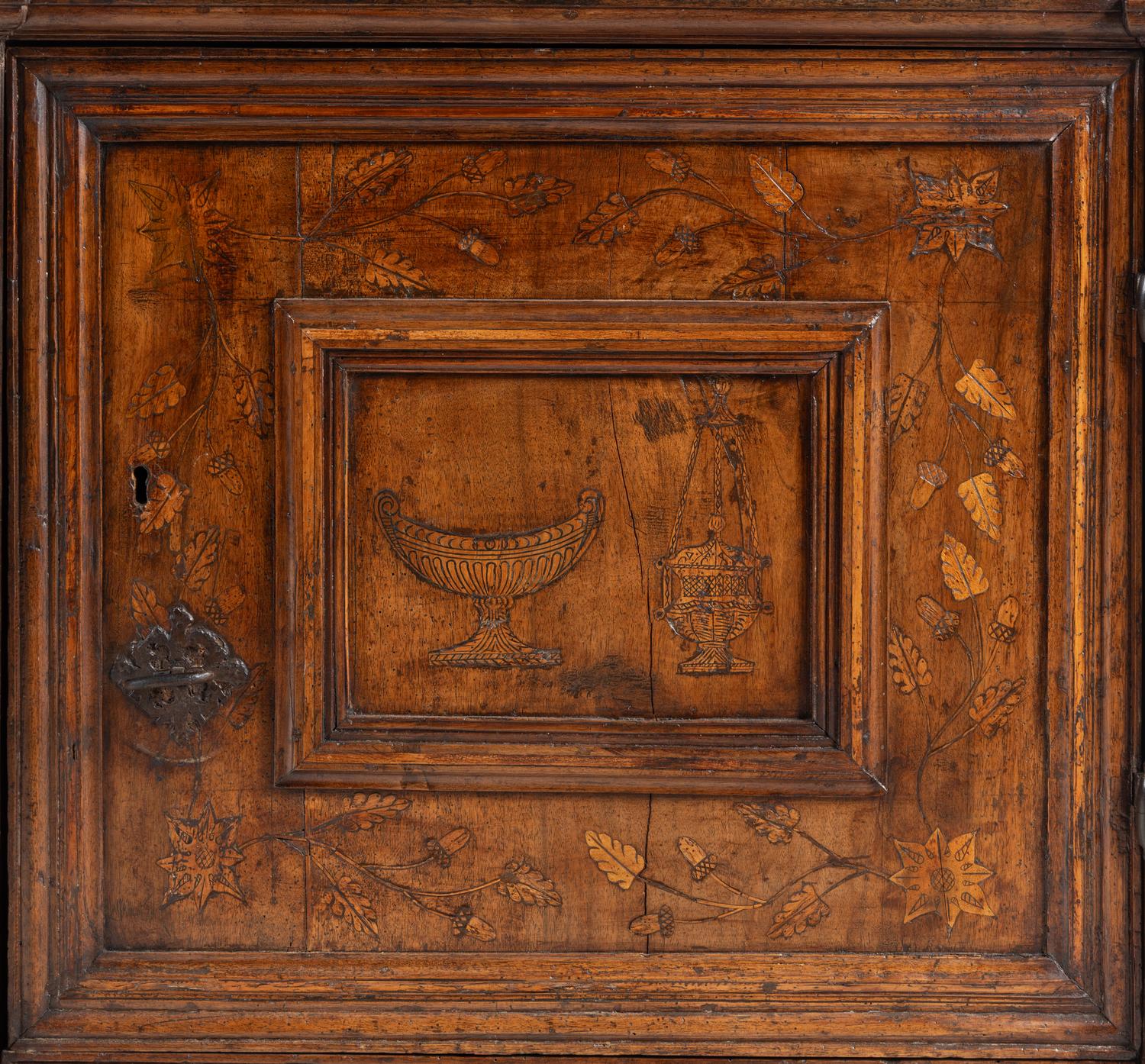 An Italian Baroque Walnut and Marquetry Cabinet