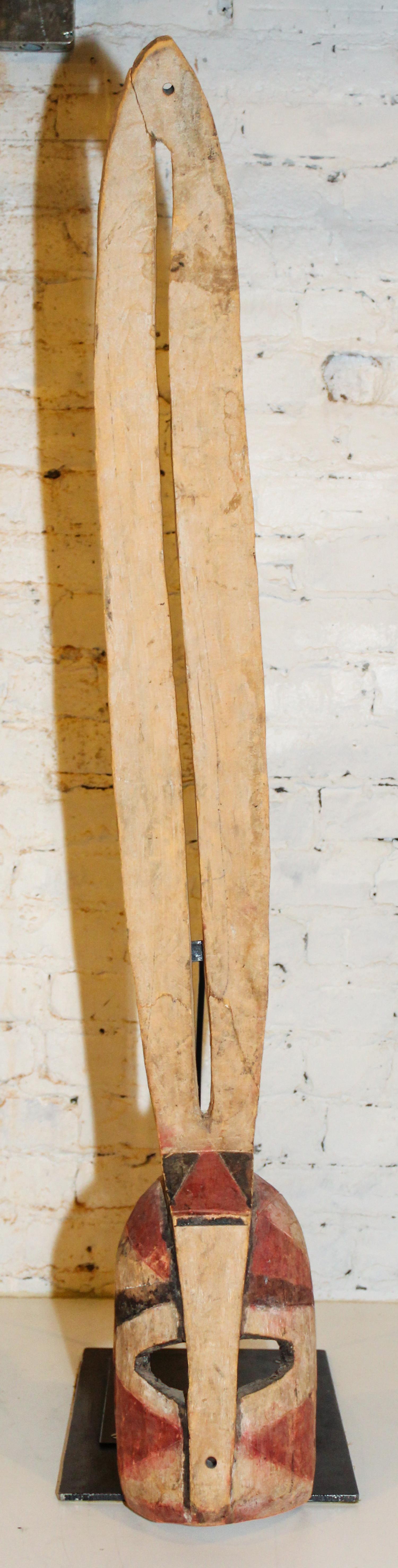 A Dogon Painted Antelope Mask. Height 48 inches.
