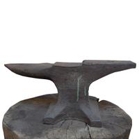 An Industrial Anvil on a Wood Base 26.5" W x 22" D x 33.5" H — United States, 19th Century