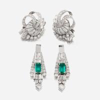 A pair of diamond, emerald, and platinum day/night earrings