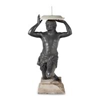 A Cast Lead Figural Sundial