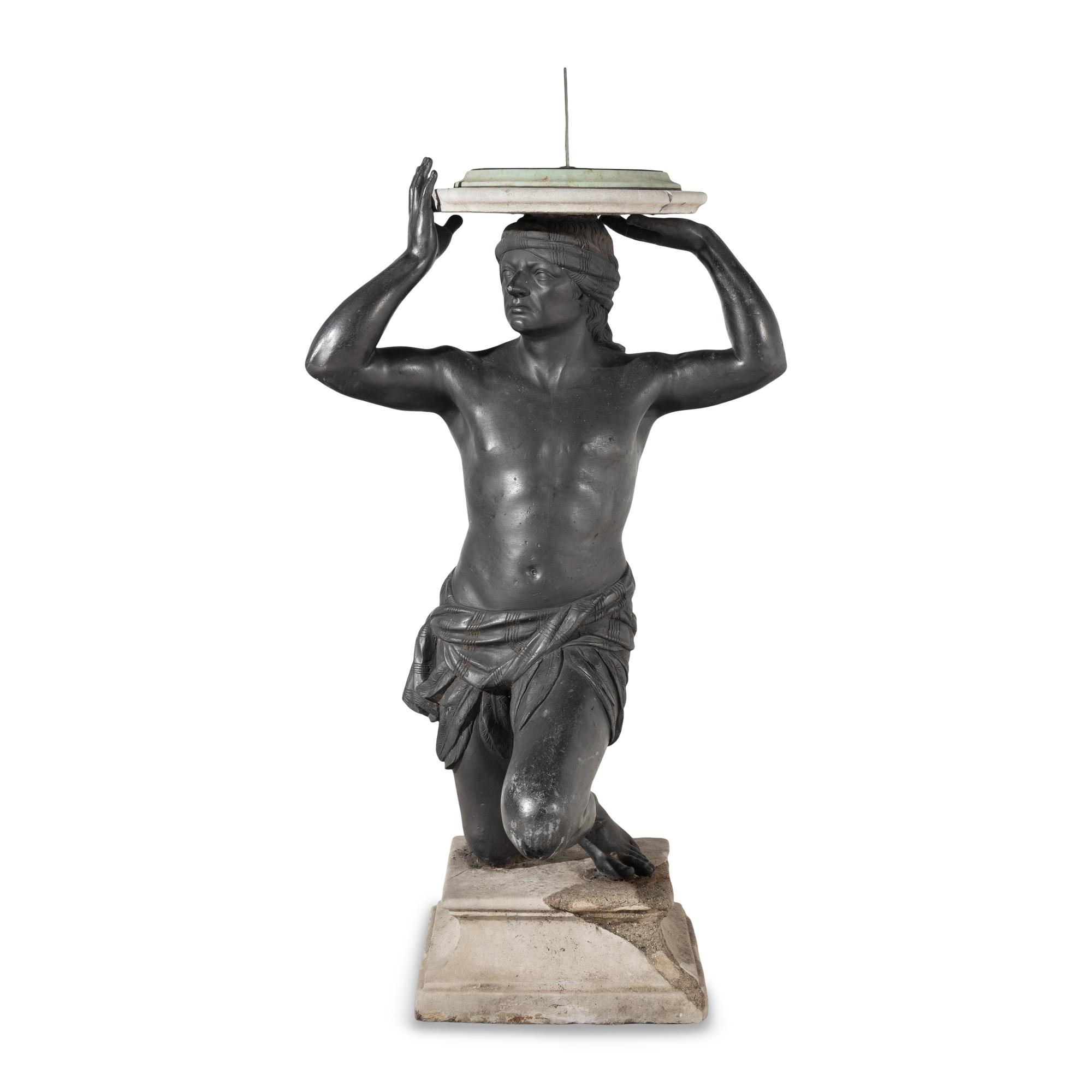 A Cast Lead Figural Sundial