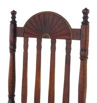 A William and Mary Style Red and Gilt Paint Decorated Bannister Back Woven Splint Seat Armchair