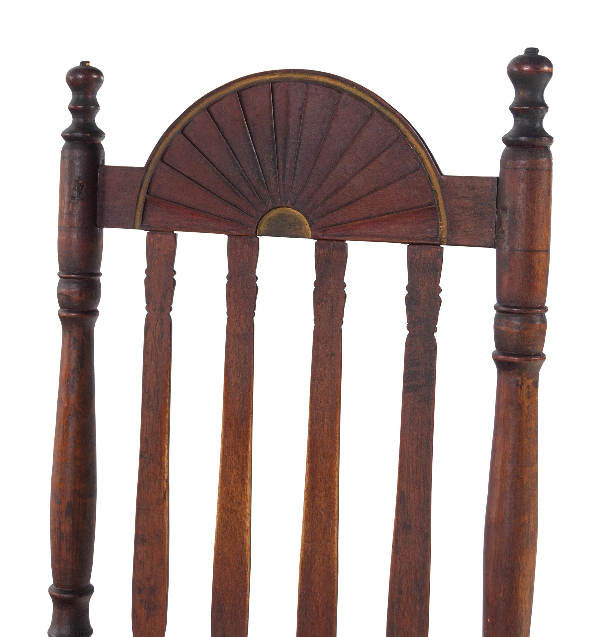 A William and Mary Style Red and Gilt Paint Decorated Bannister Back Woven Splint Seat Armchair