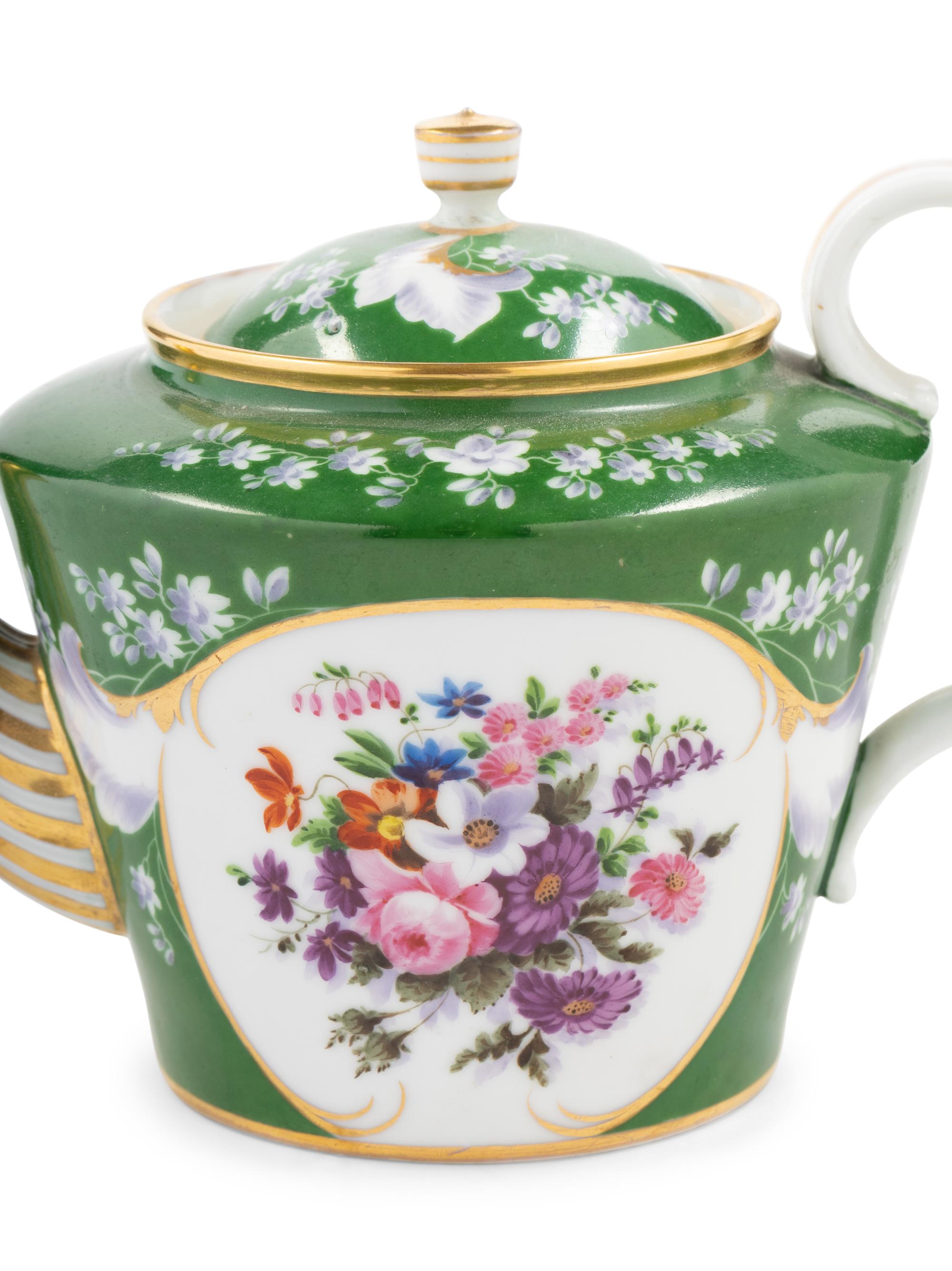 A Popov Porcelain Three-Piece Tea Service