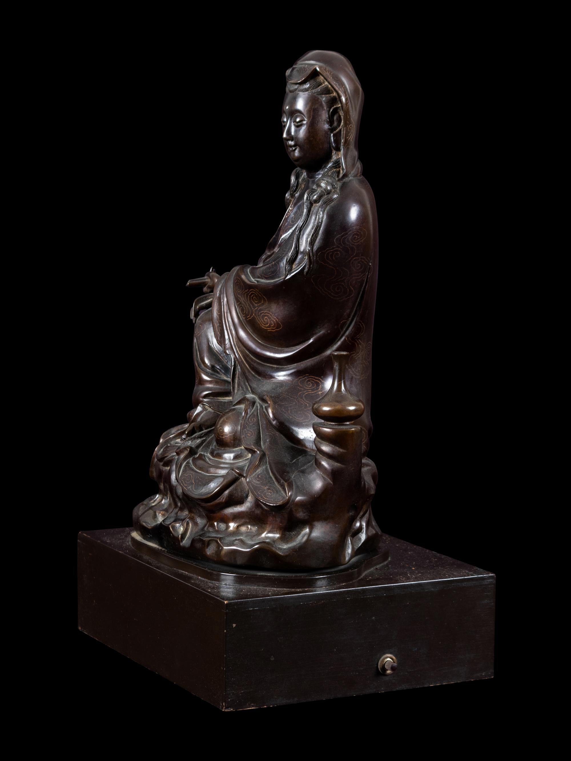 A Silver Inlaid Bronze Figure of Guanyin
