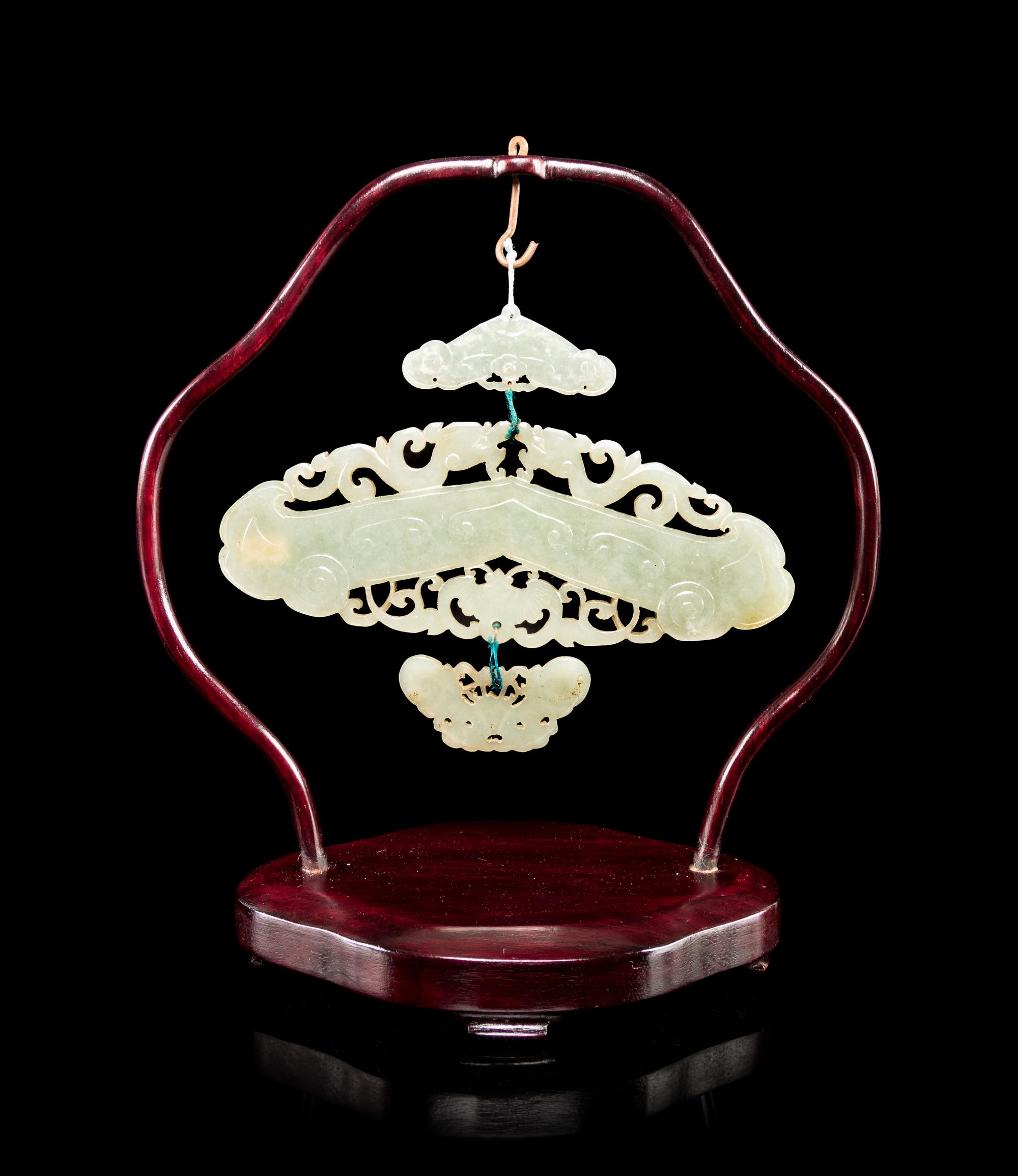 A Celadon Jade Chime-Form Pendant
