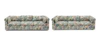 A Pair of Custom Woven Reed Three-Cushion Sofas