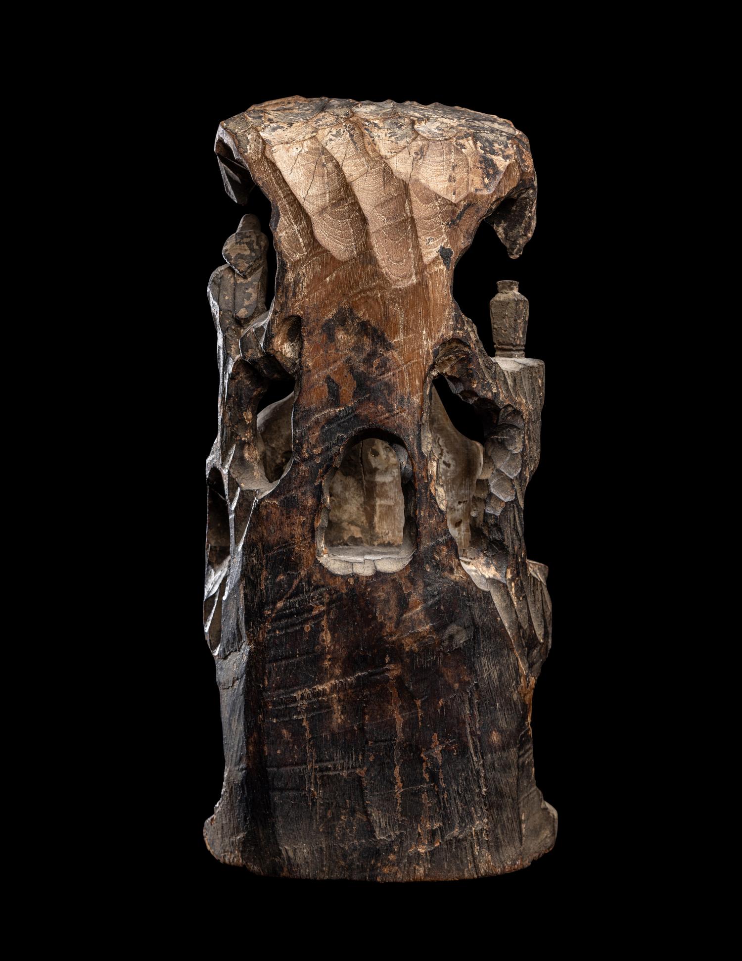 A Chinese Carved Wood Figure of Guanyin
