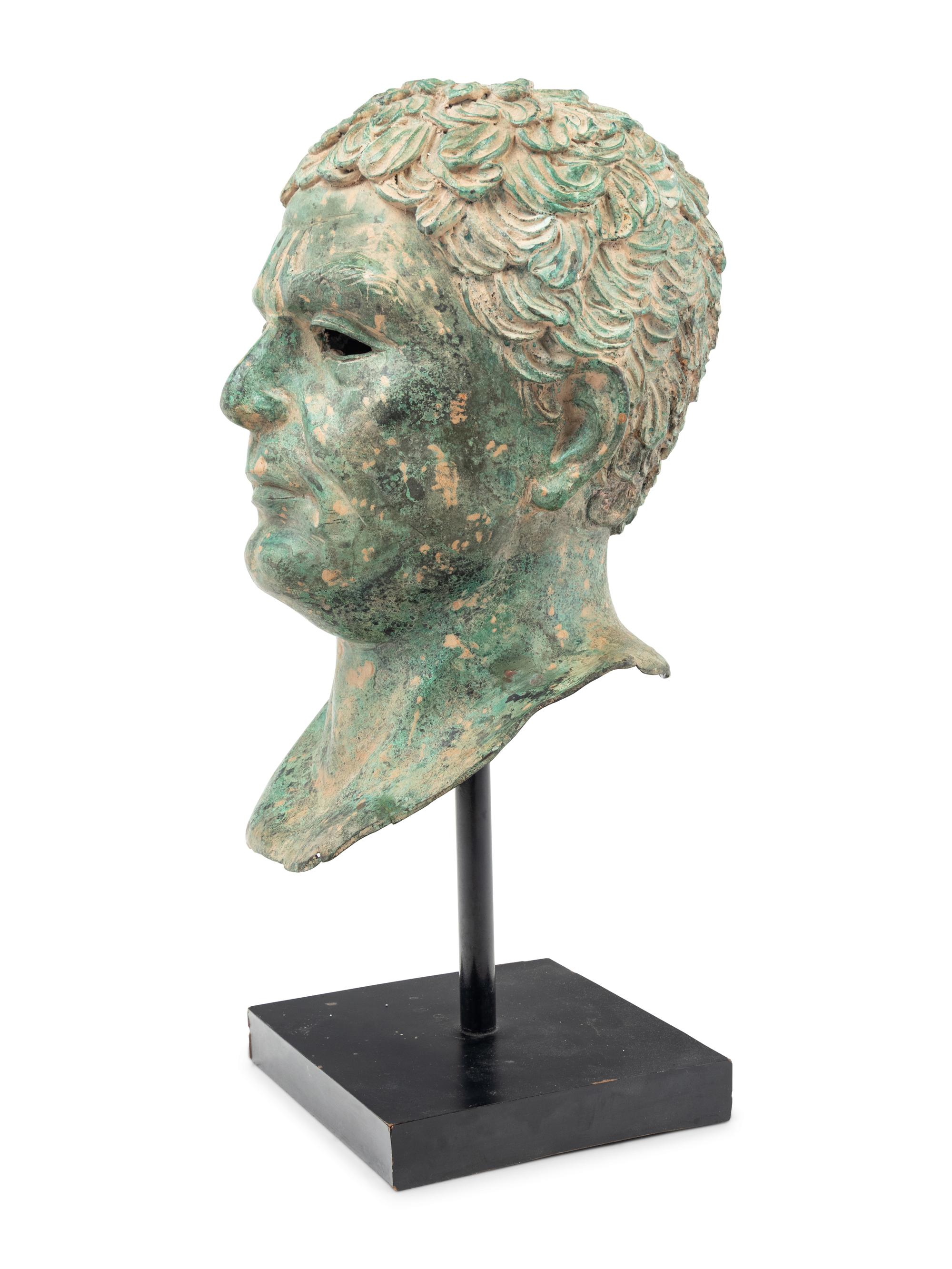 A Patinated Metal Portrait Head