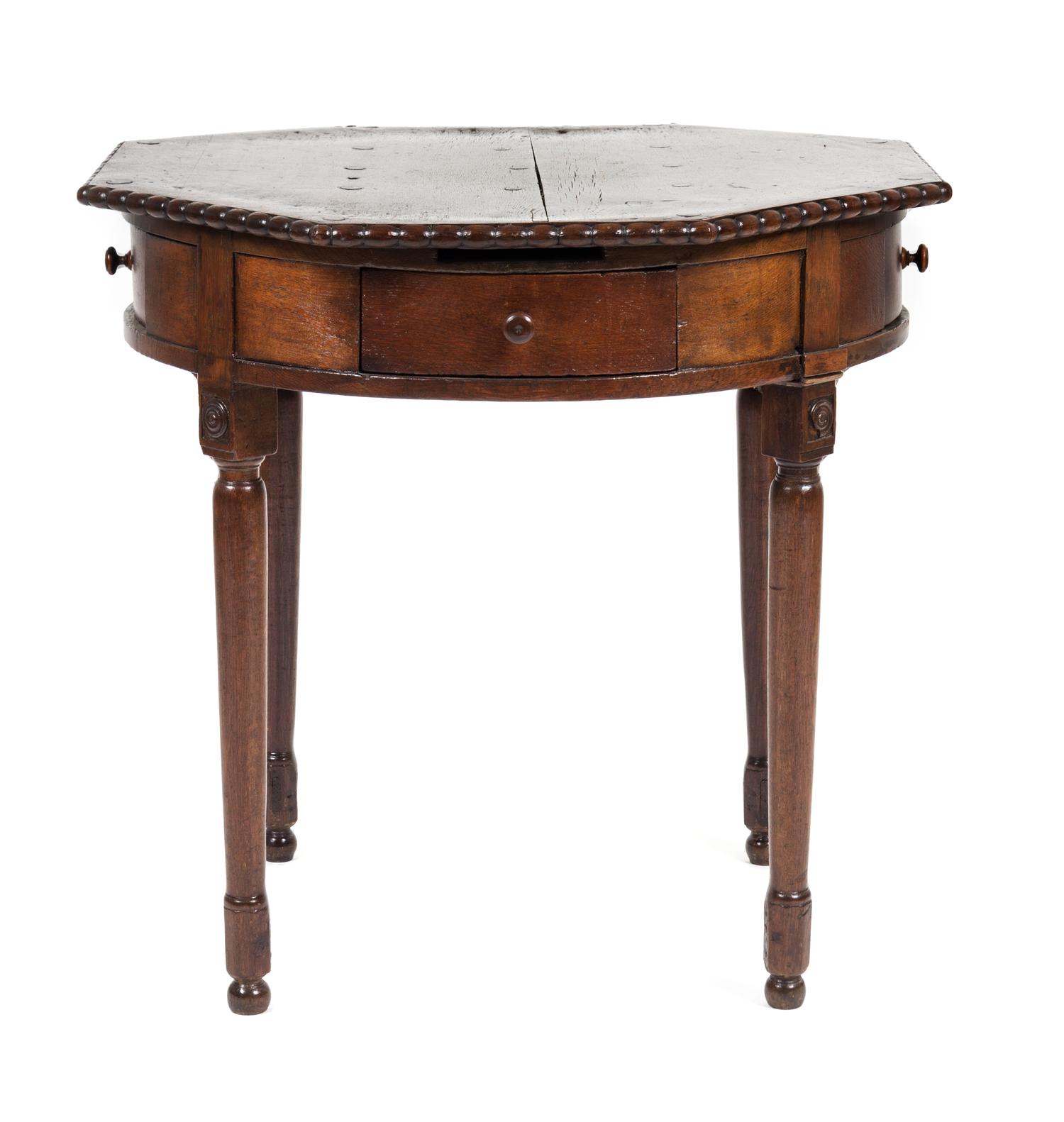 A Continental Oak Side Table Height 30 x diameter 29 inches.