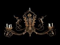 A Wrought Iron and Tôle Six-Light Chandelier