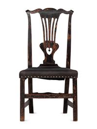A Chippendale Carved and Black-Painted Walnut Side Chair