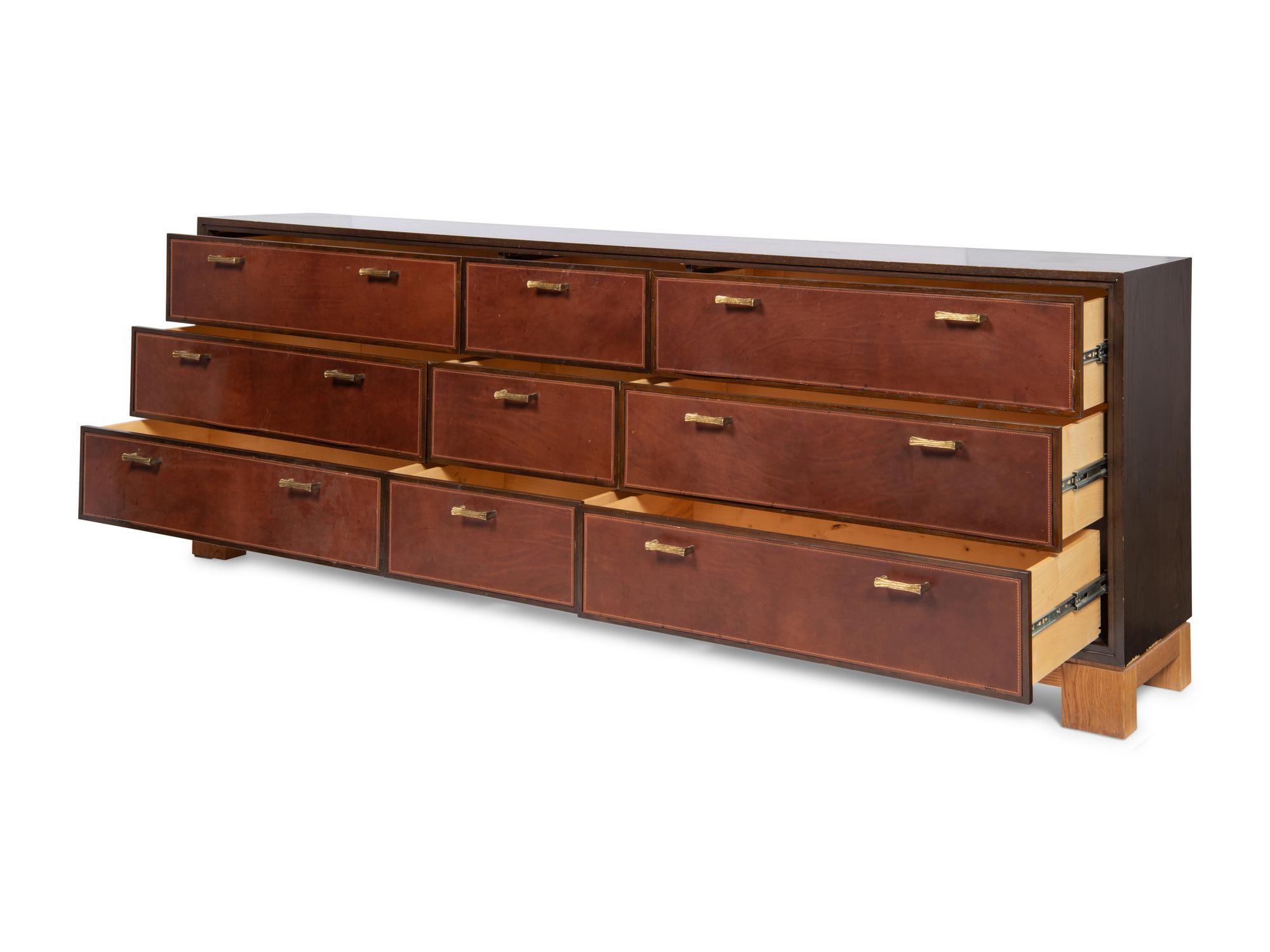 An Oak and Leather-Veneered and Brass Mounted Cabinet