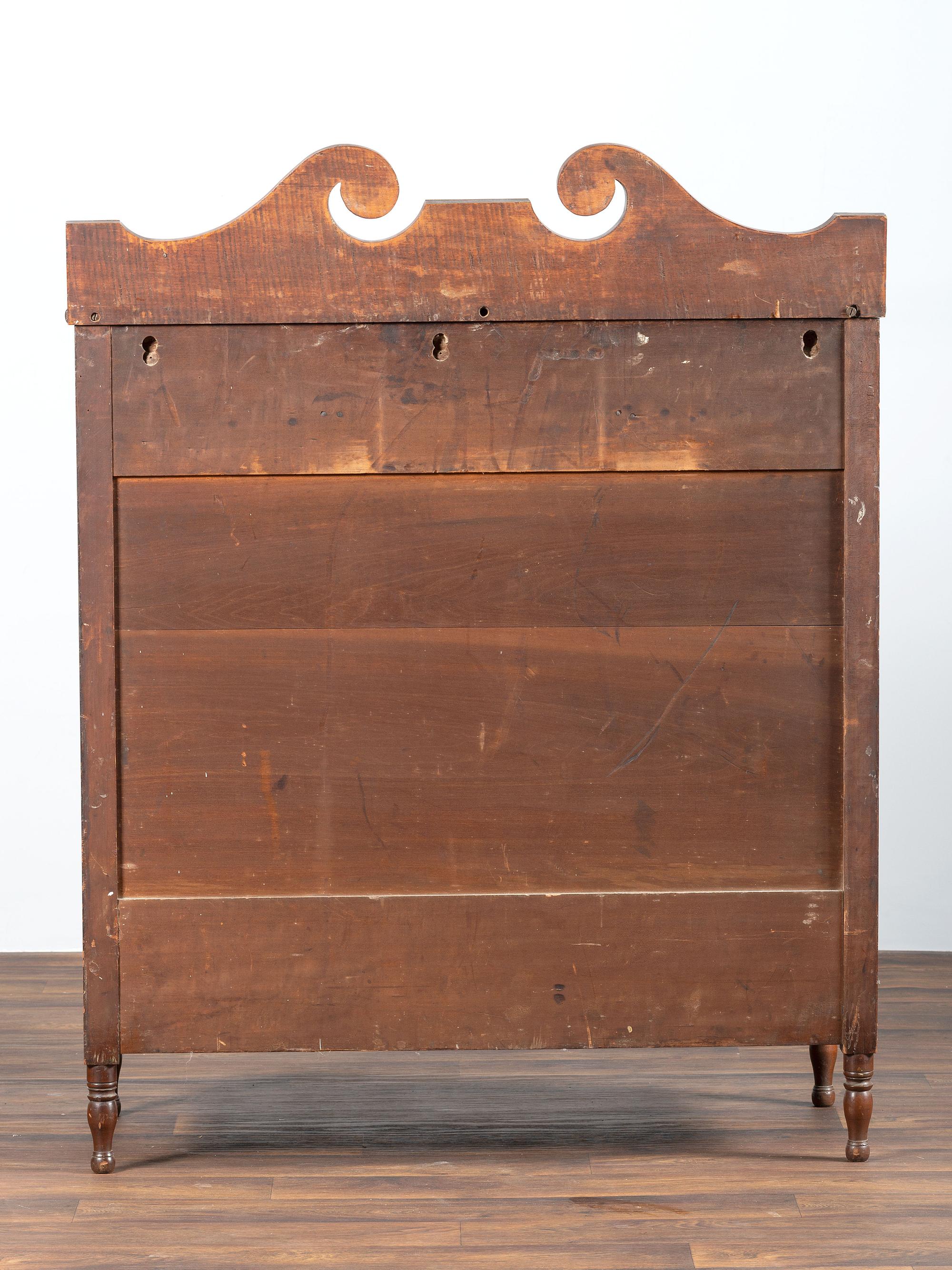 A Late Federal Figured Maple and Cherrywood Chest of Drawers